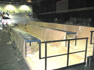 A modular staging system designed for versatility and stability, the Metrodeck platform features interlocking panels made of durable materials, suitable for various events and performances. The platform is adjustable in height, allowing for custom configurations to meet specific needs. It is equipped with non-slip surfaces for safety and can support significant weight loads, making it ideal for concerts, exhibitions, and theater productions. The Metrodeck system also includes a range of accessories such as risers and guardrails, enhancing its functionality and safety features